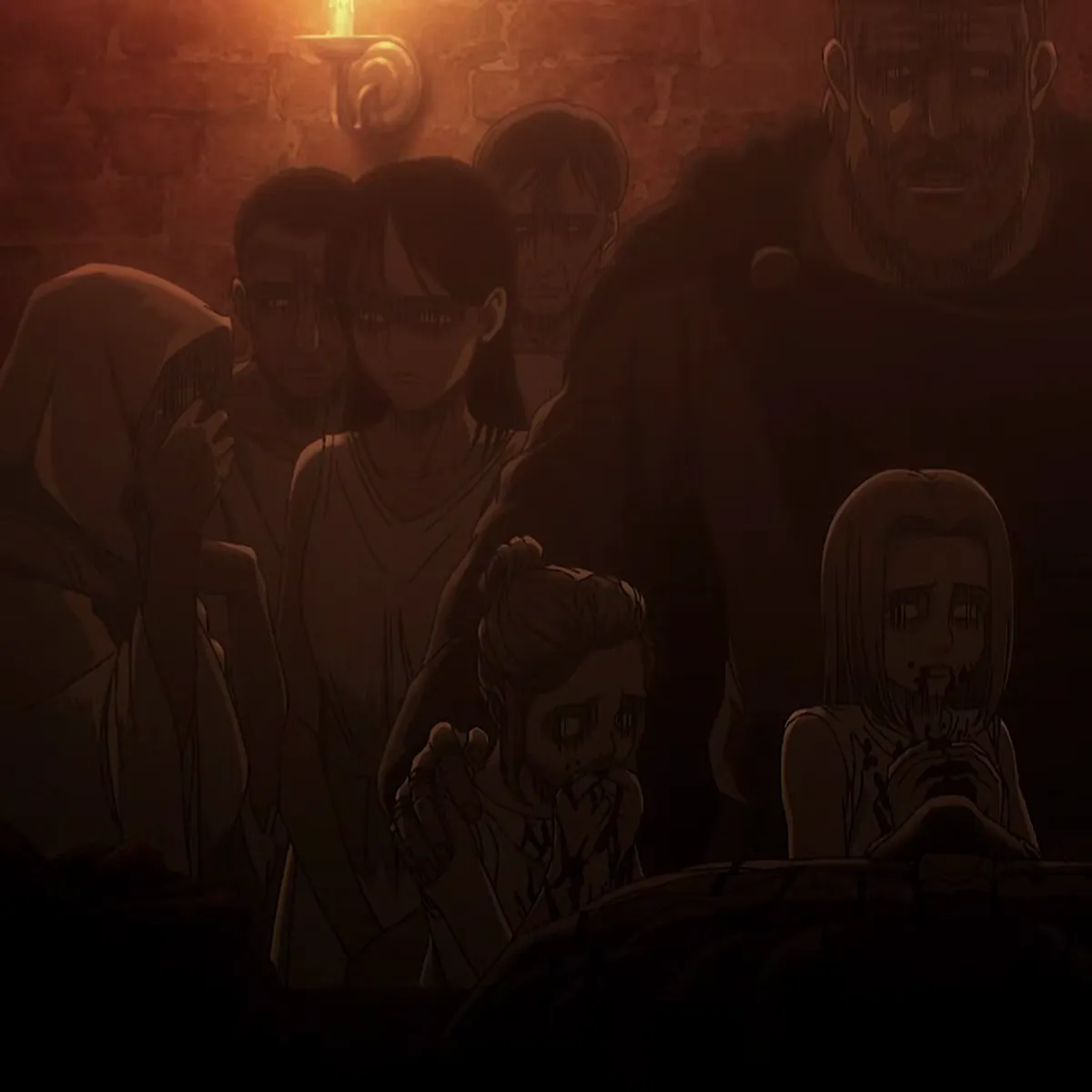 Ymir's people, in rags and huddled in the dark by torchlight