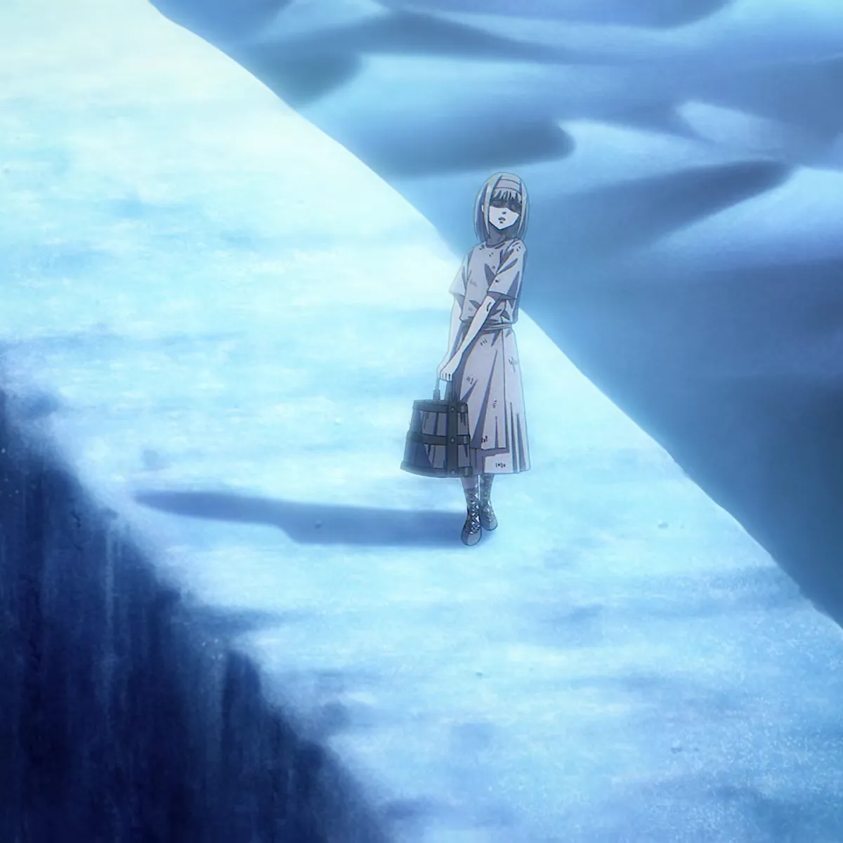 Ymir Fritz alone on the white sand of the Paths, carrying a bucket